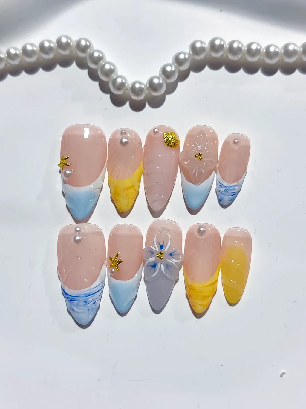 Nude Blue Yellow White French tip Flower Star Shell press on nails detail view