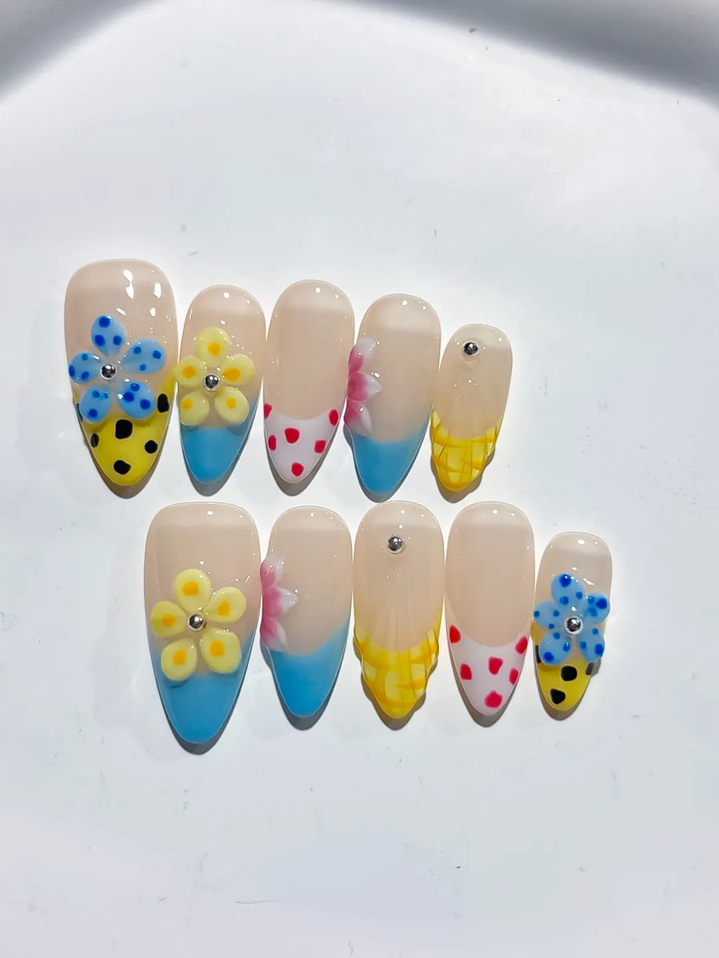 Nude Blue Yellow Pink Red Abstract Flower Dot Pattern press on nails detail view