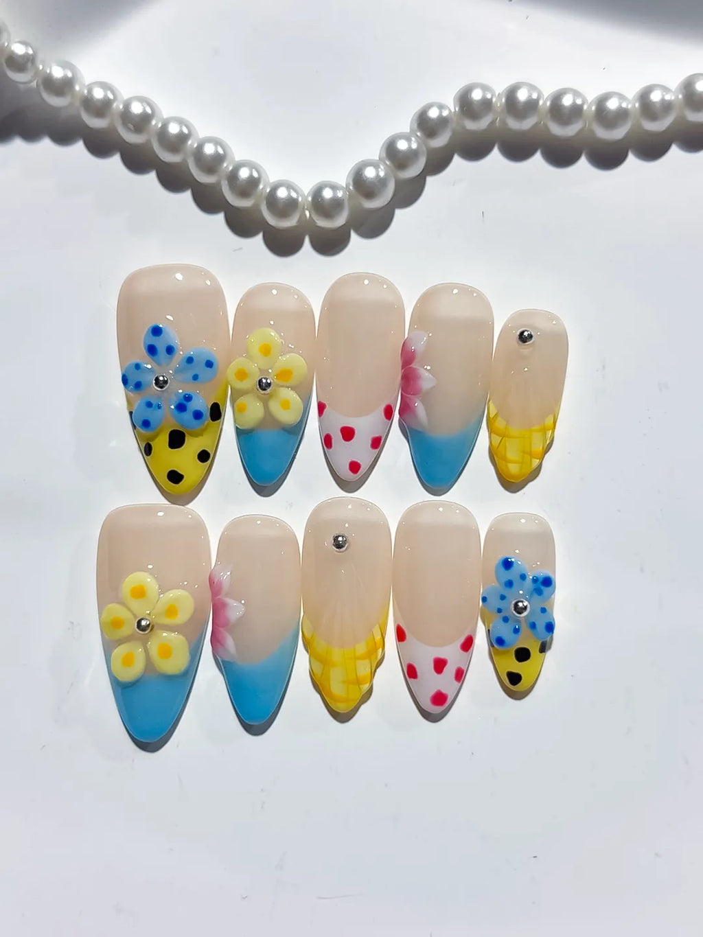 Nude Blue Yellow Pink Red Abstract Flower Dot Pattern press on nails detail view
