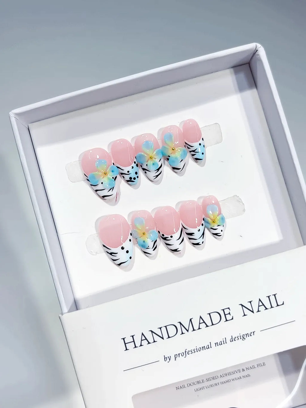 Pink White Black Blue Abstract Flower Animal Print press on nails angled view