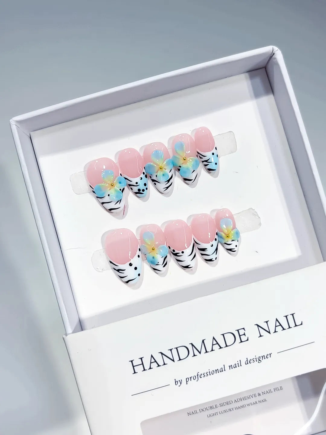 Pink White Black Blue Abstract Flower Animal Print press on nails angled view