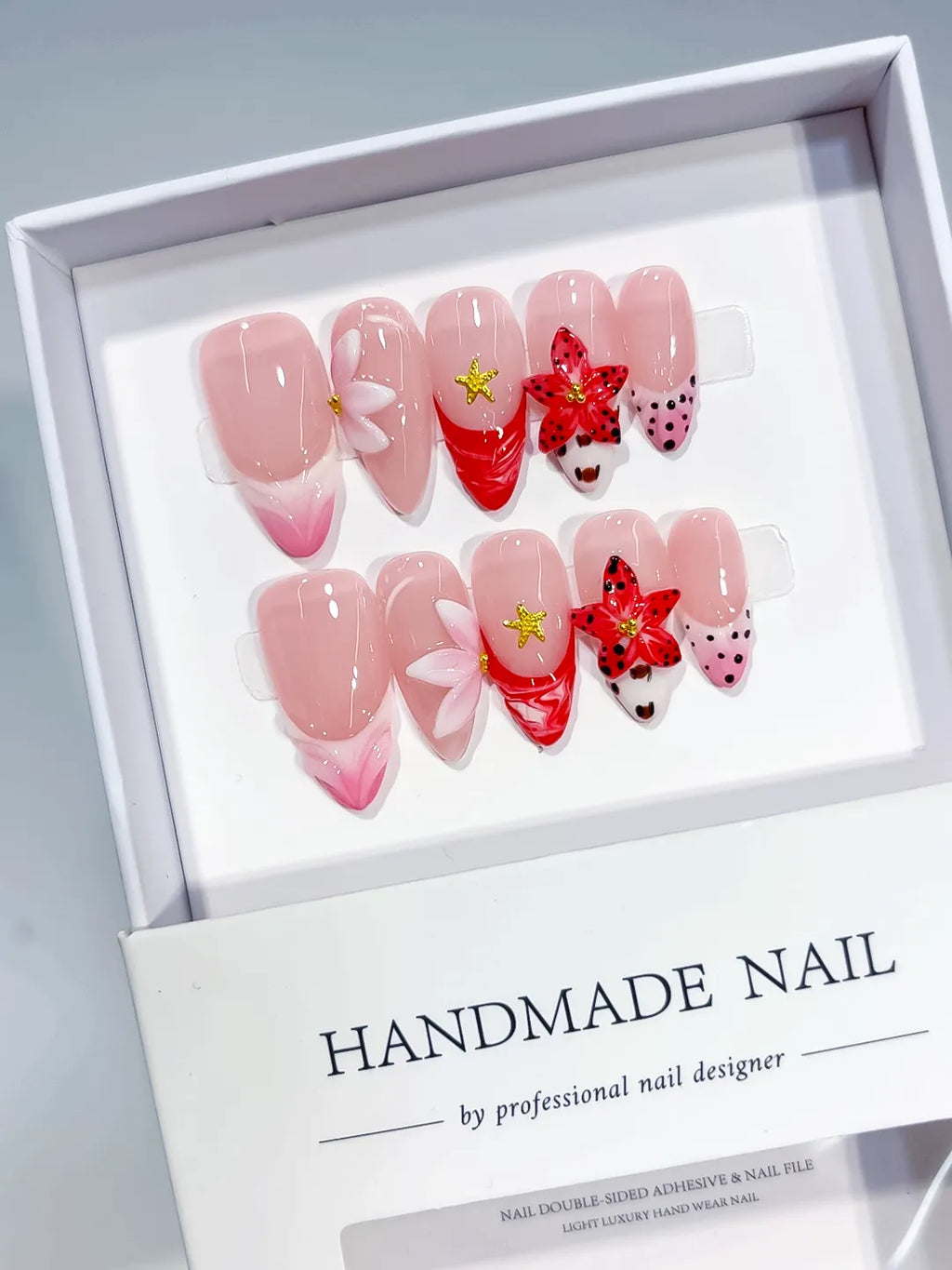 Pink Red White Black Abstract Flower Star Dot Pattern press on nails angled view
