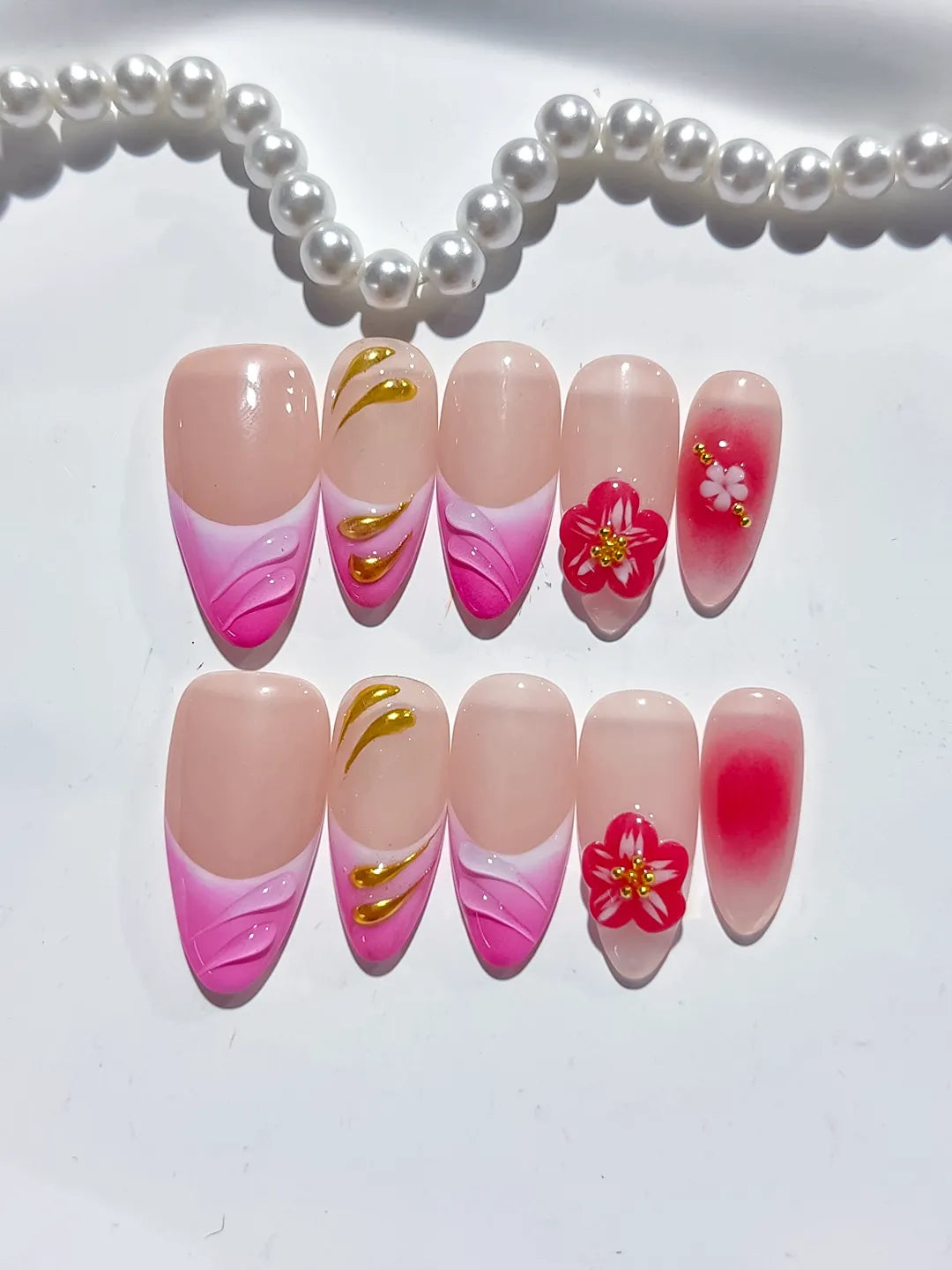 Gold Red Pink Nude press on nails close up