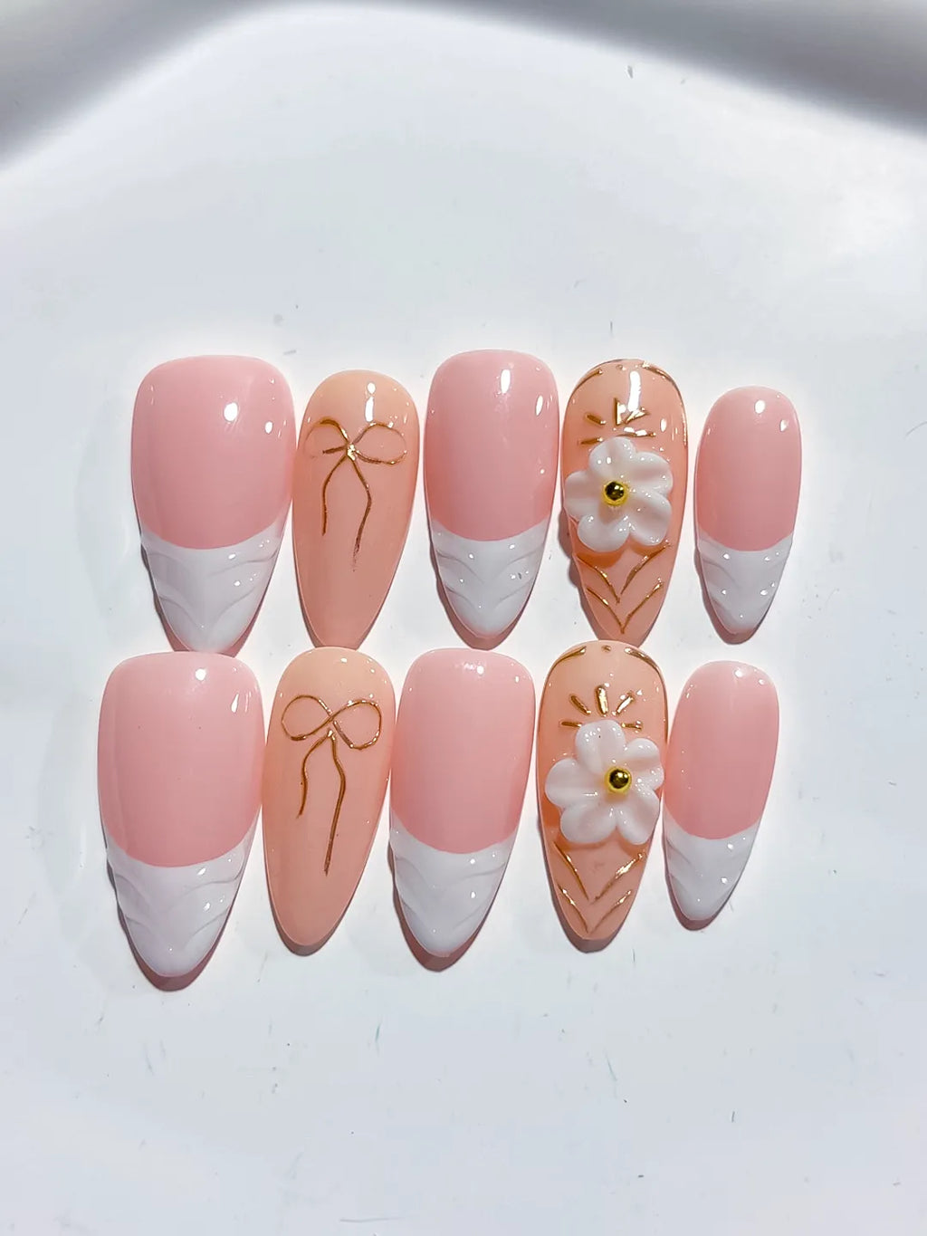 Pink White Nude French tip Flower Bow press on nails close up