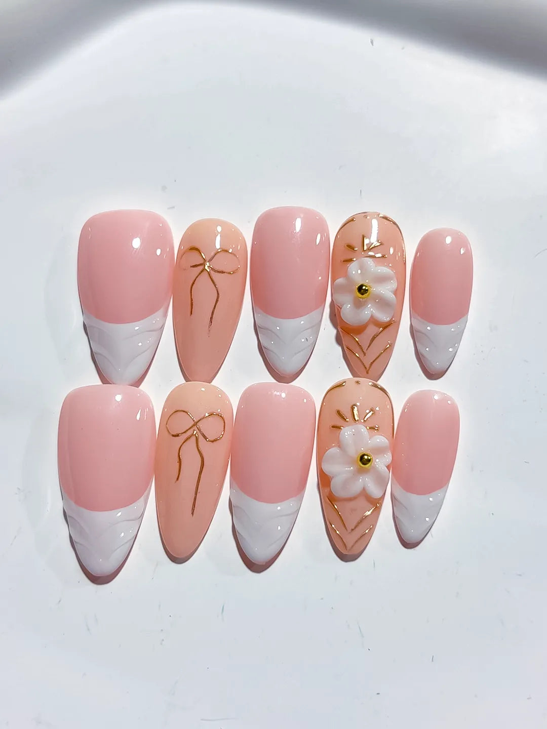 Pink White Nude French tip Flower Bow press on nails close up