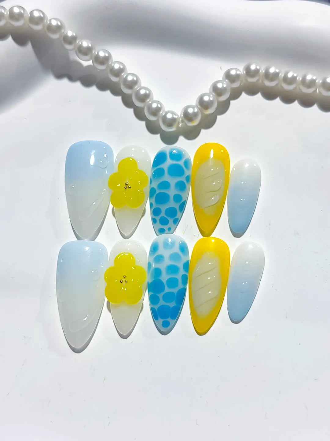 White Blue Yellow Abstract Flower Dot Pattern Shell press on nails detail view