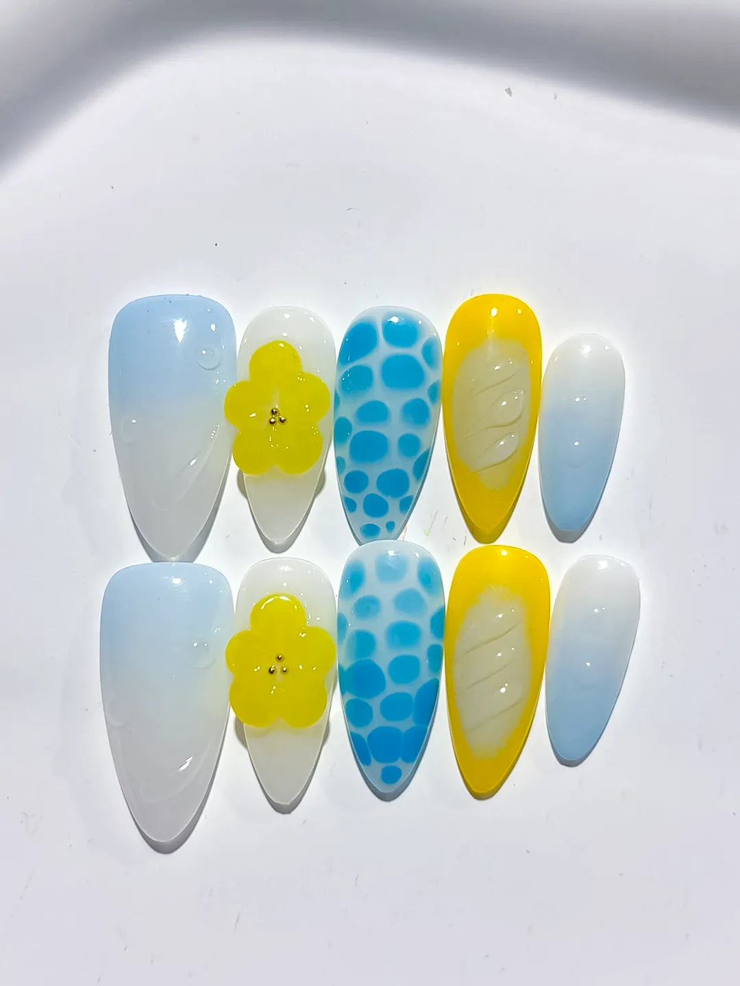 White Blue Yellow Abstract Flower Dot Pattern Shell press on nails detail view