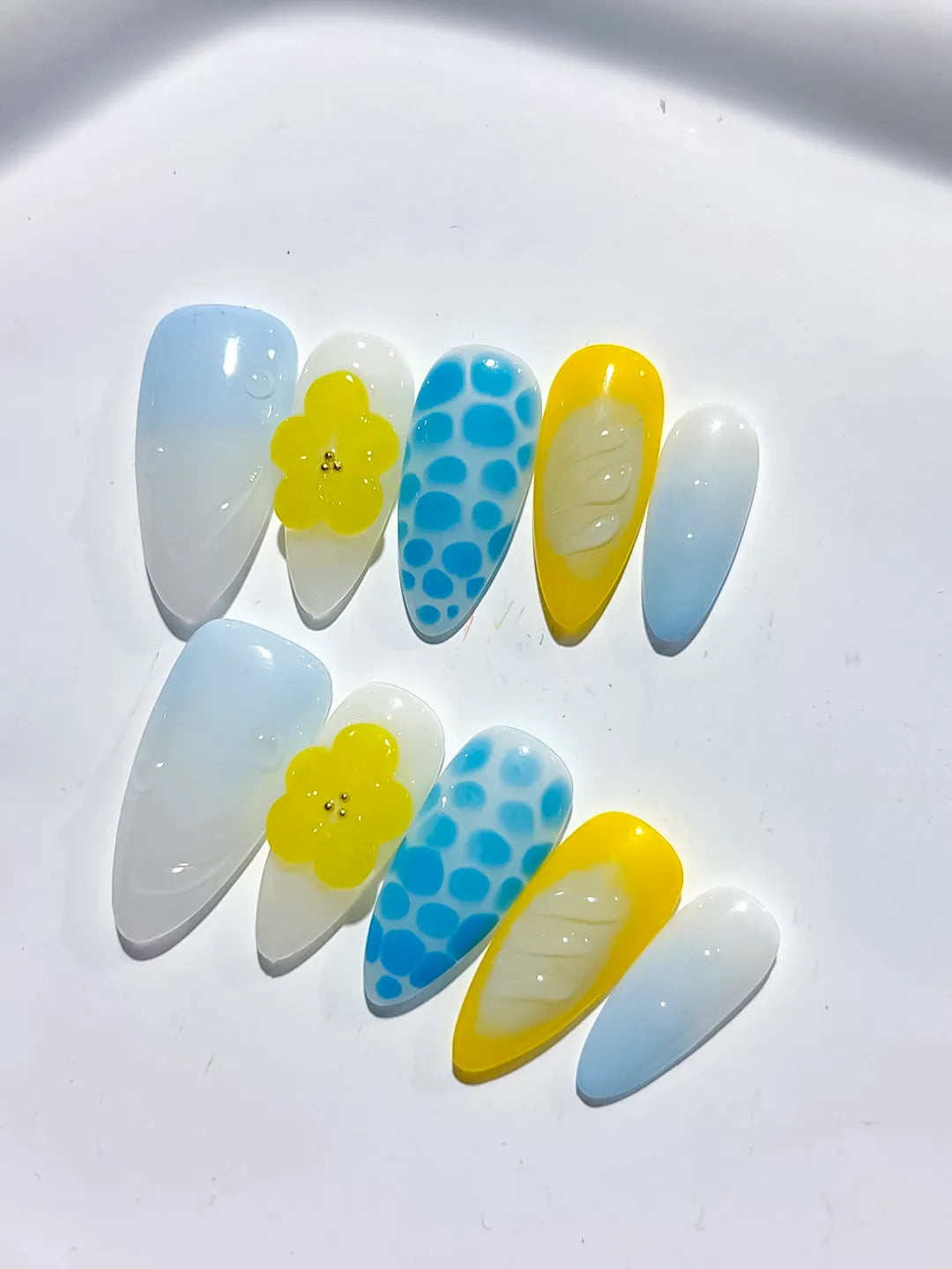 White Blue Yellow Abstract Flower Dot Pattern Shell press on nails detail view