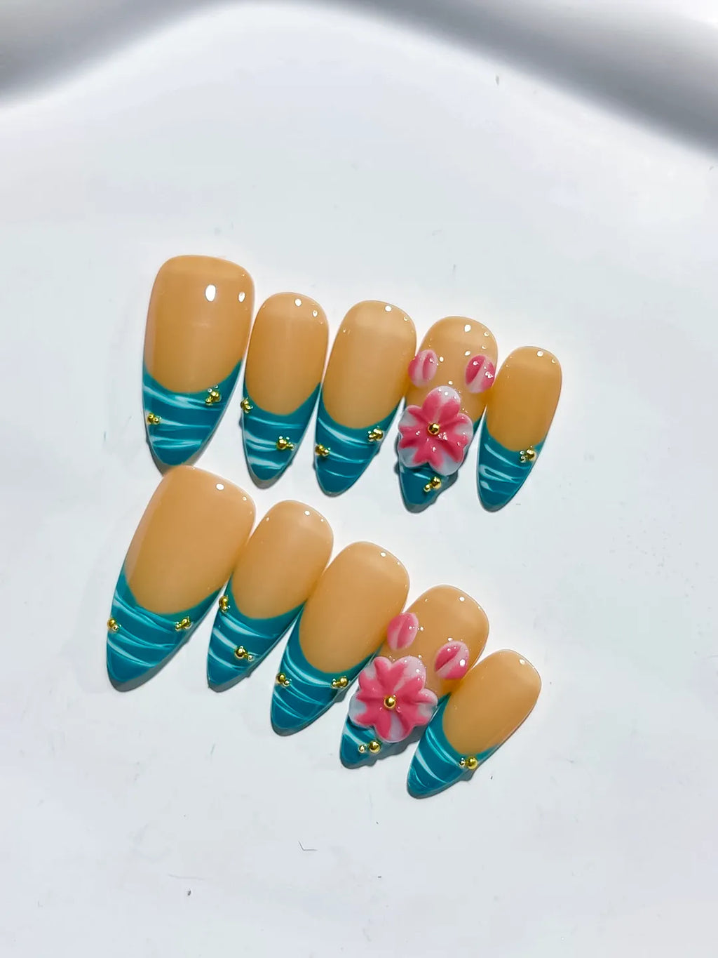 Nude Blue Pink French tip Flower Metallic Charm press on nails close up