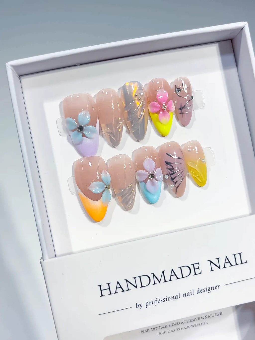 Nude Yellow Blue Purple Silver Abstract Flower Leaf Metallic Charm press on nails angled view