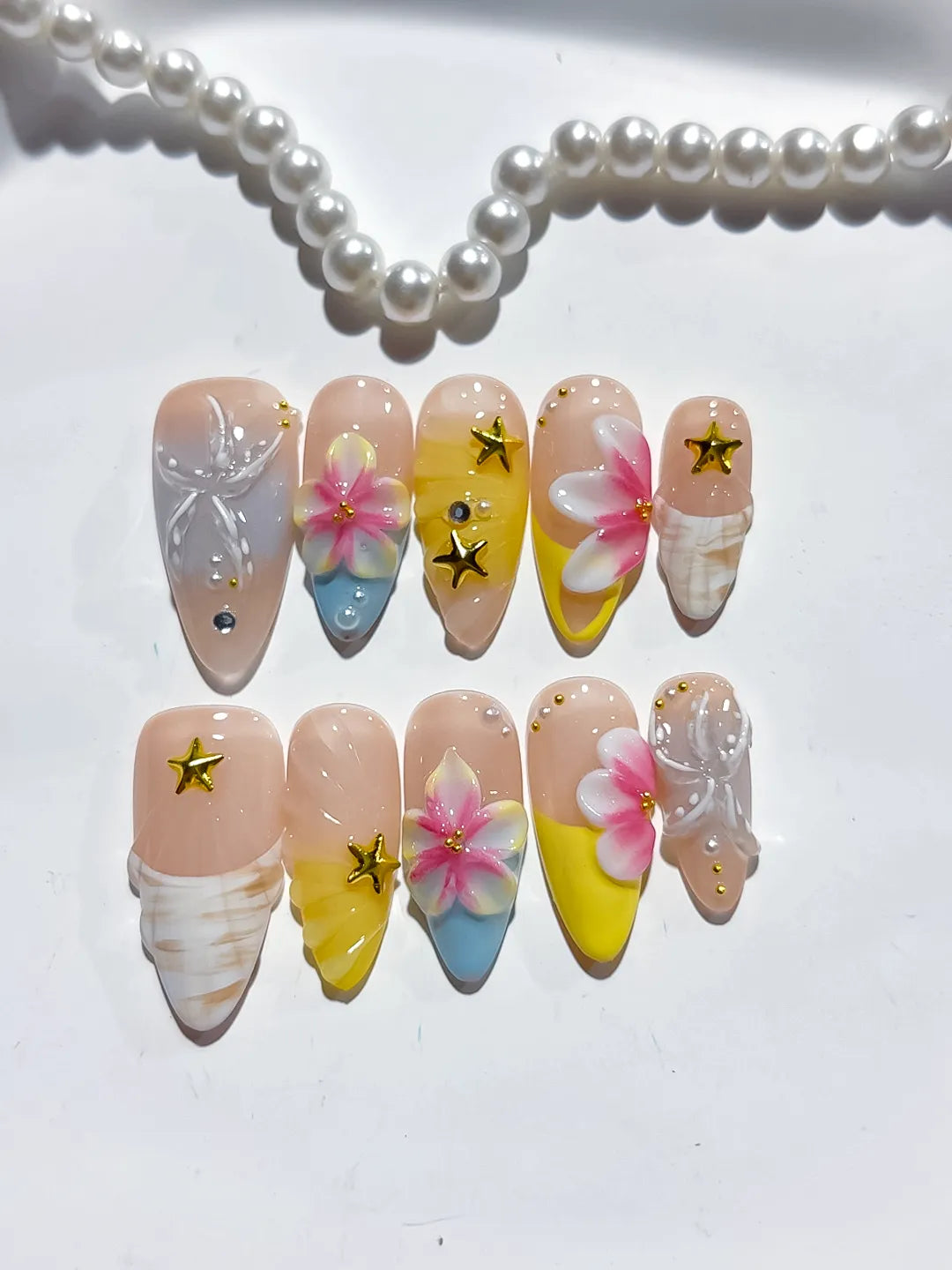 Nude White Blue Yellow French tip Flower Bow Star press on nails detail view