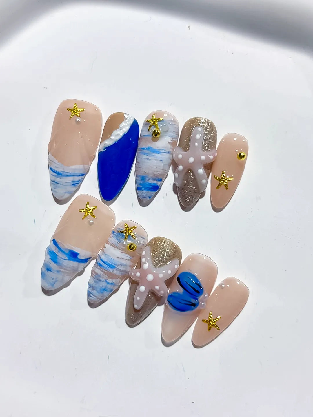 Nude Blue White Gold Abstract Starfish Shell Glitter press on nails close up