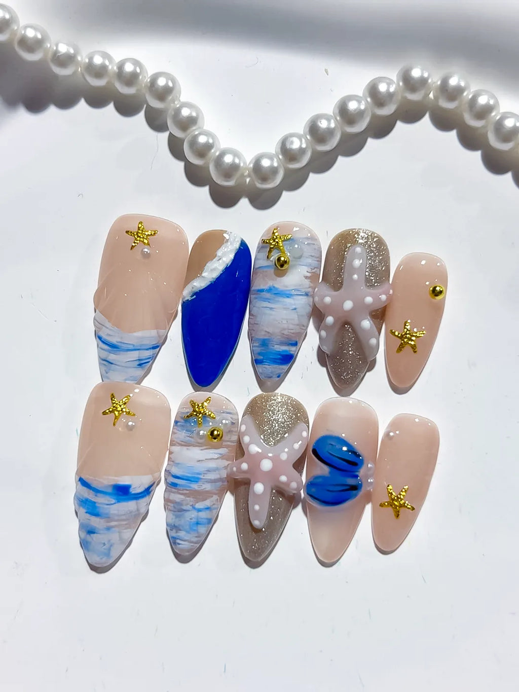 Nude Blue White Gold Abstract Starfish Shell Glitter press on nails detail view