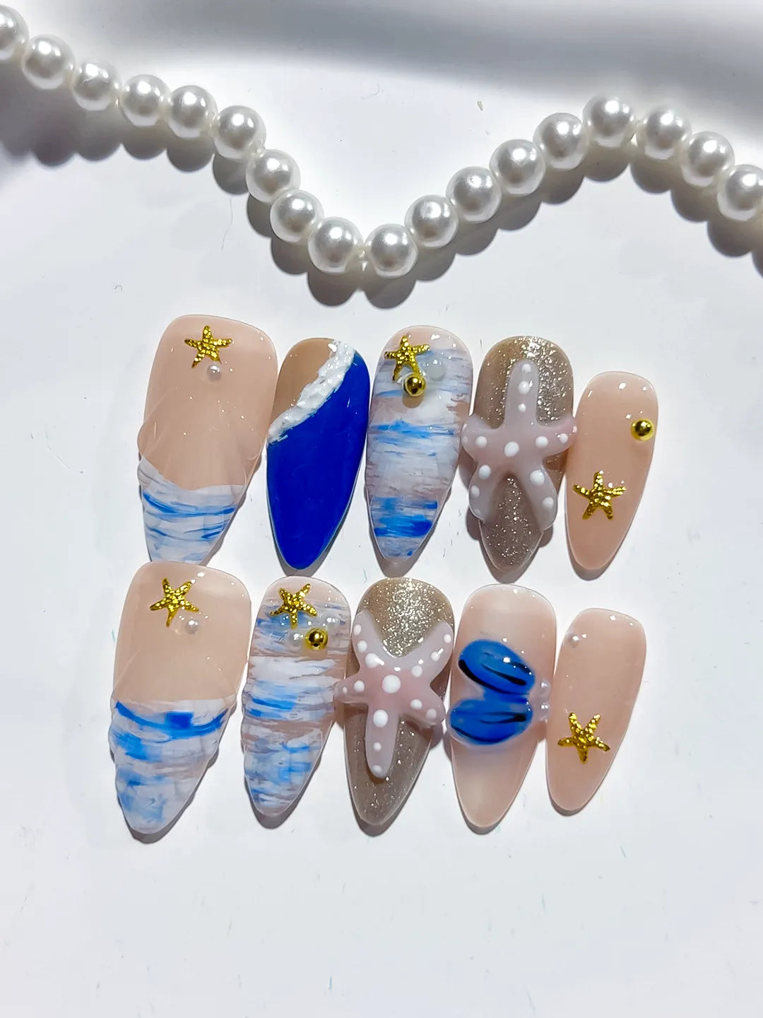 Nude Blue White Gold Abstract Starfish Shell Glitter press on nails detail view