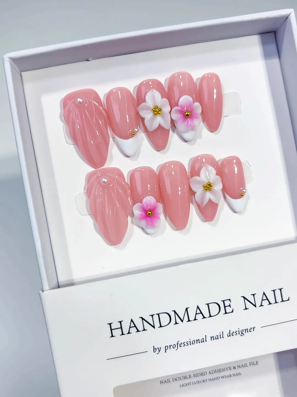 Pink White Solid color Flower press on nails angled view
