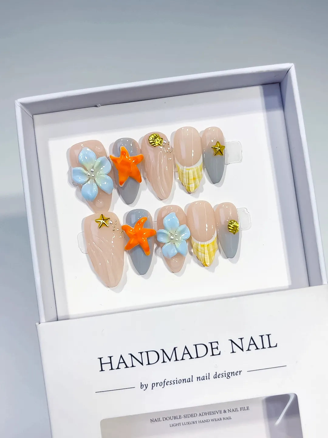 Nude Silver Yellow Blue French tip Flower Dot Pattern press on nails angled view