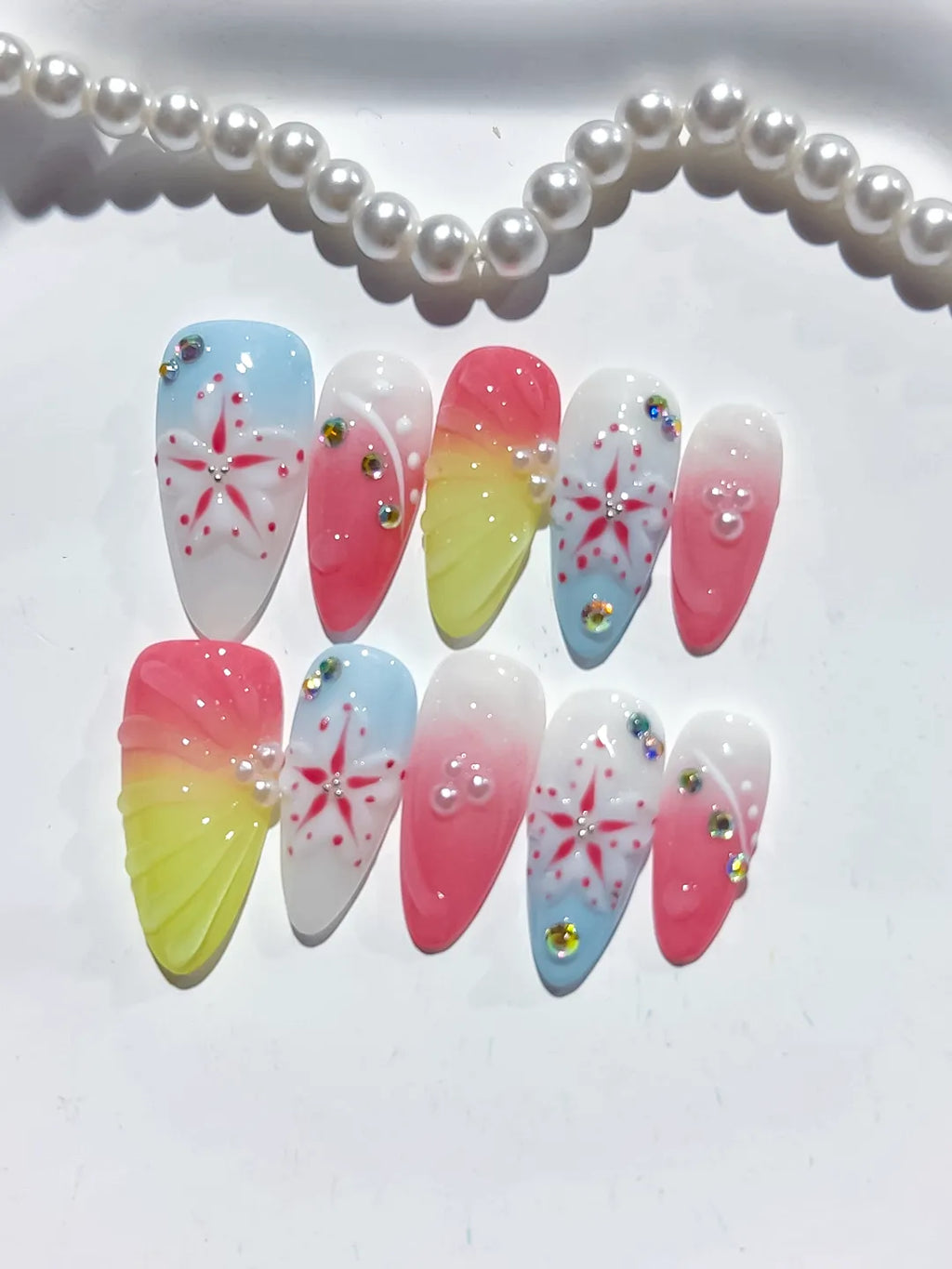 Nude White Blue Yellow French tip Flower Bow Star press on nails detail view