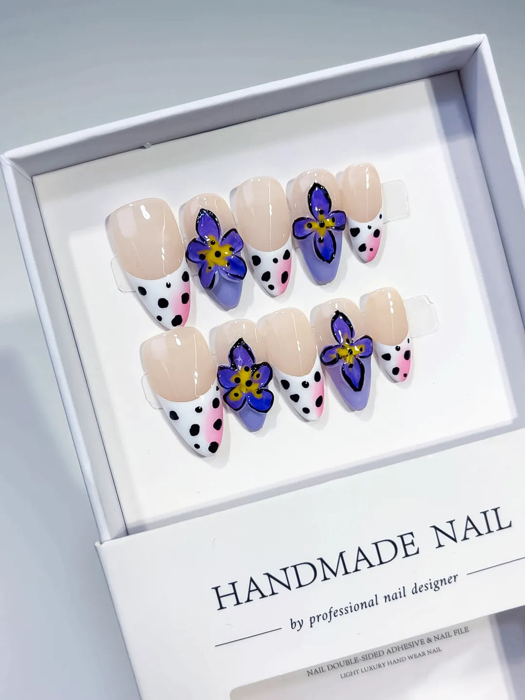 Nude Black White Yellow French tip Flower Animal Print Rhinestone press on nails angled view