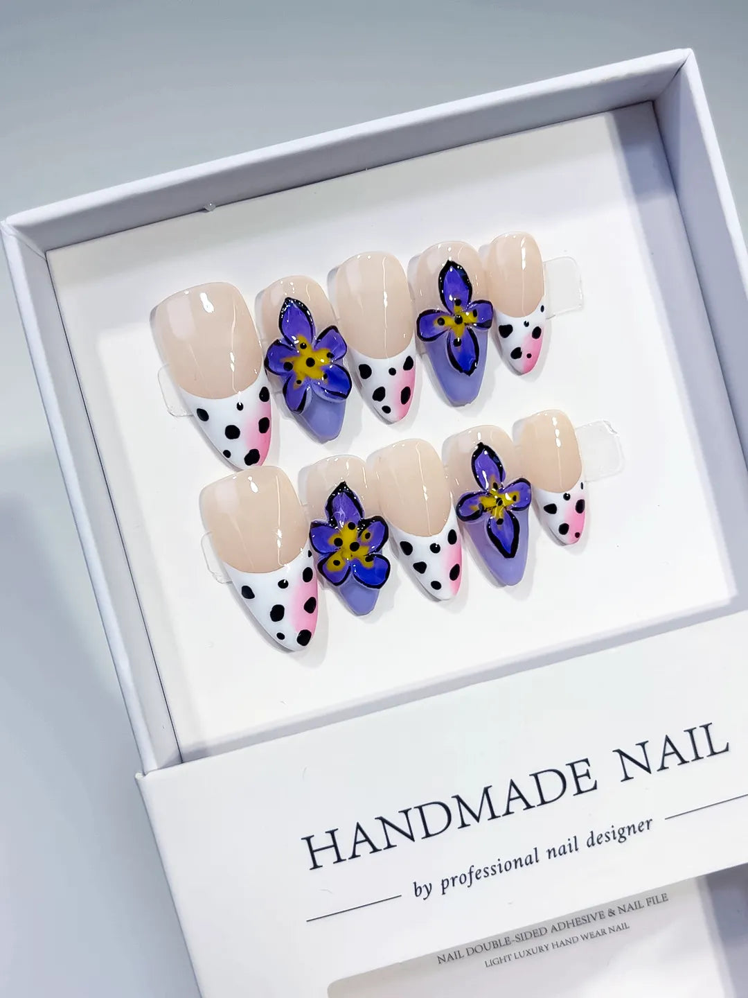 Nude Black White Yellow French tip Flower Animal Print Rhinestone press on nails angled view
