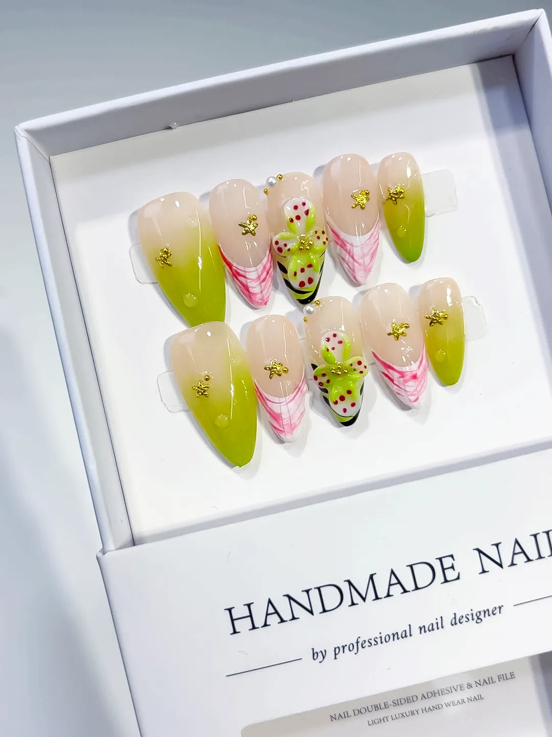 Nude Pink Black Silver French tip Cherry Animal Print Rhinestone press on nails angled view