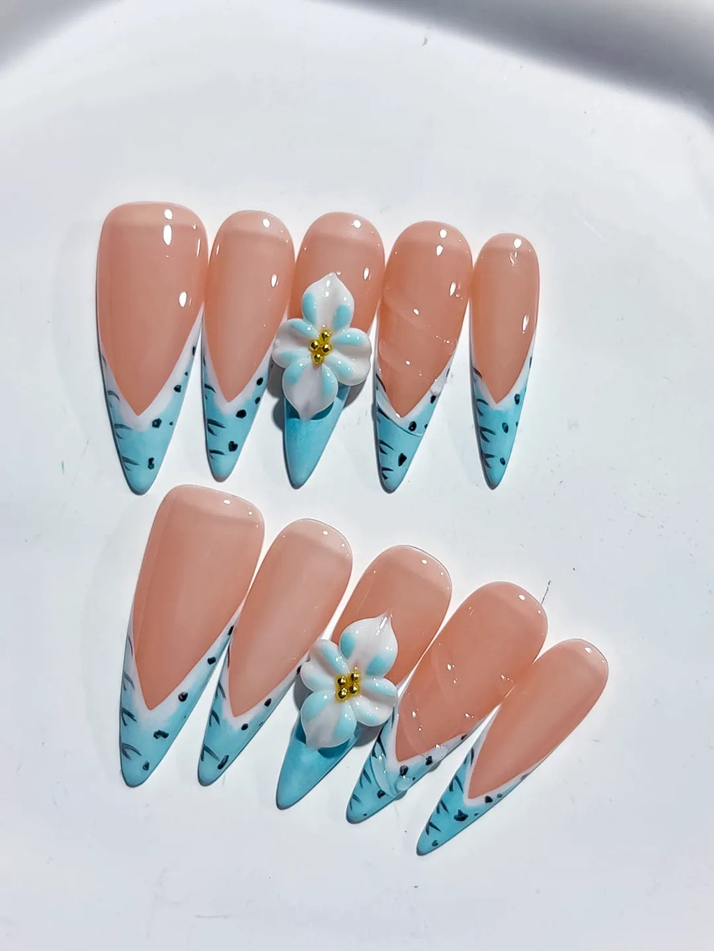 Nude Blue French tip Flower Animal Print press on nails detail view