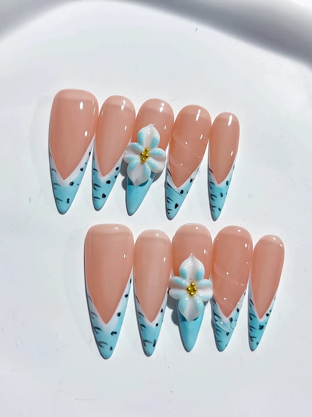 Nude Blue French tip Flower Animal Print press on nails detail view