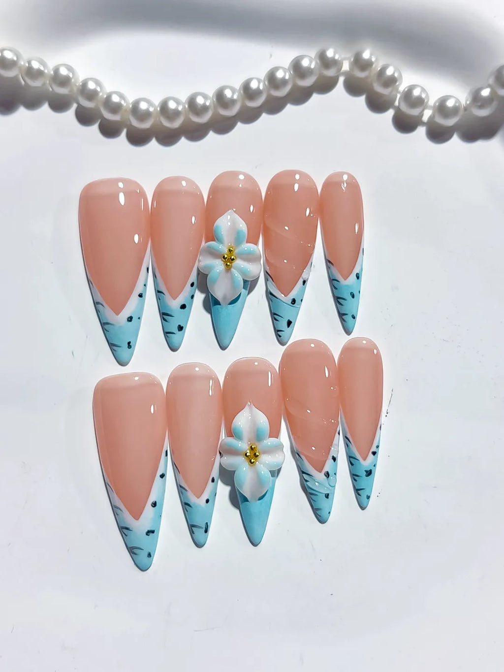 Nude Blue French tip Flower Animal Print press on nails detail view