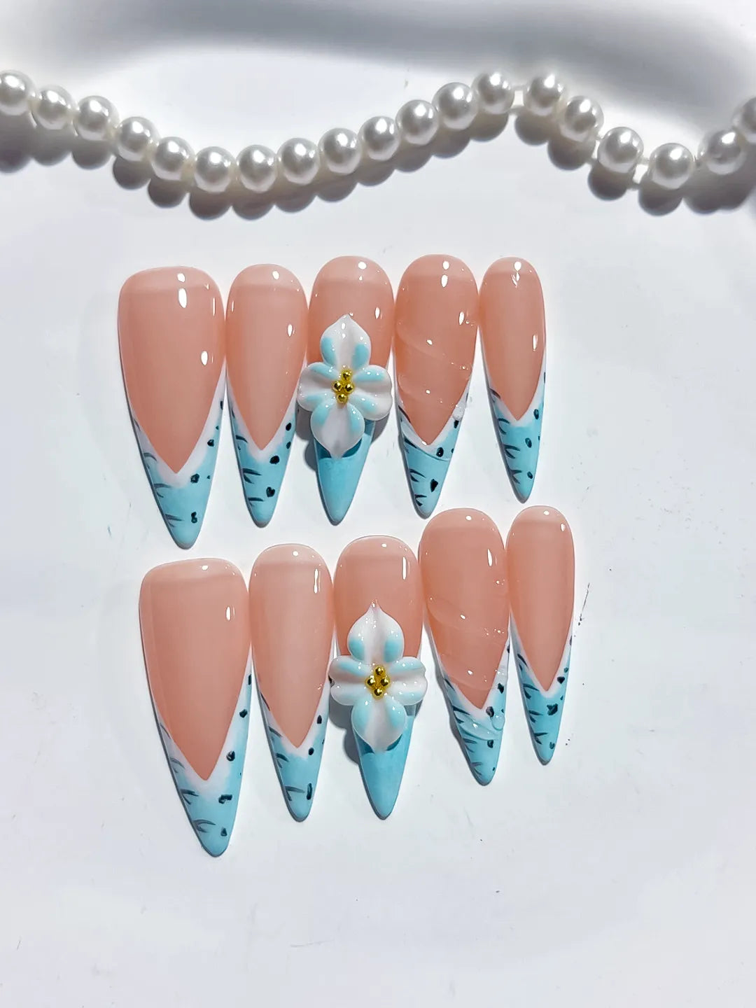 Nude Blue French tip Flower Animal Print press on nails detail view