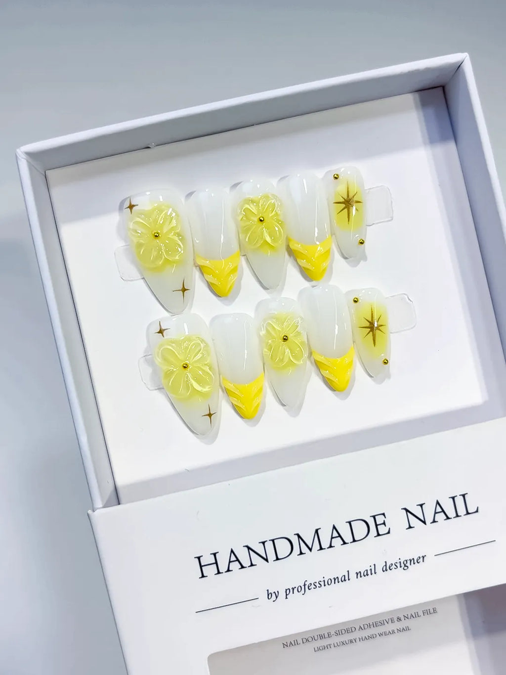 White Yellow French tip Flower Star press on nails angled view