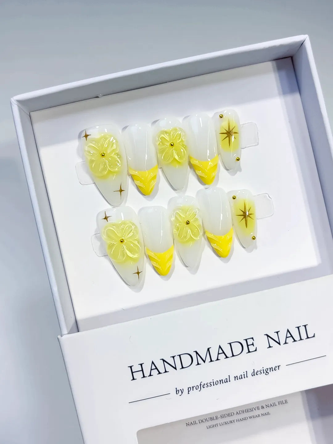 White Yellow French tip Flower Star press on nails angled view