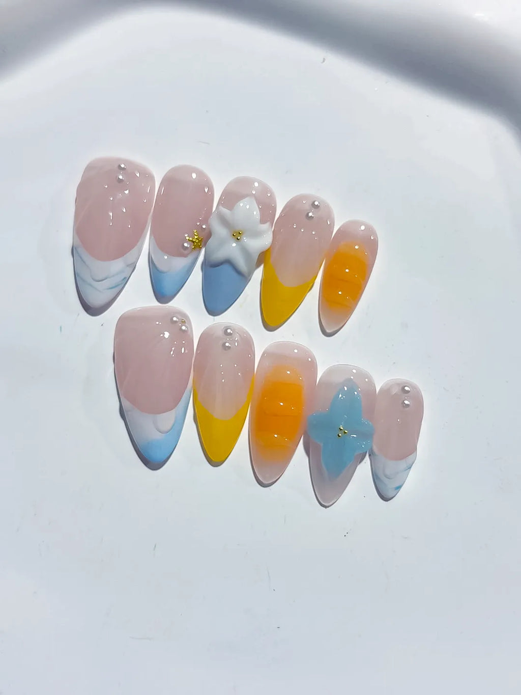 Nude Blue Yellow White French tip Flower Pearl press on nails close up