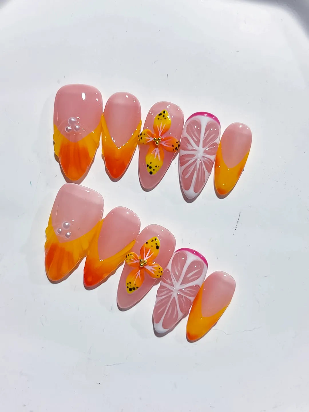 Nude Orange Pink French tip Flower Fruit press on nails close up