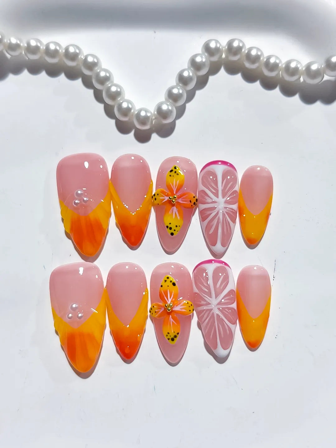 Nude Orange Pink French tip Flower Fruit press on nails detail view