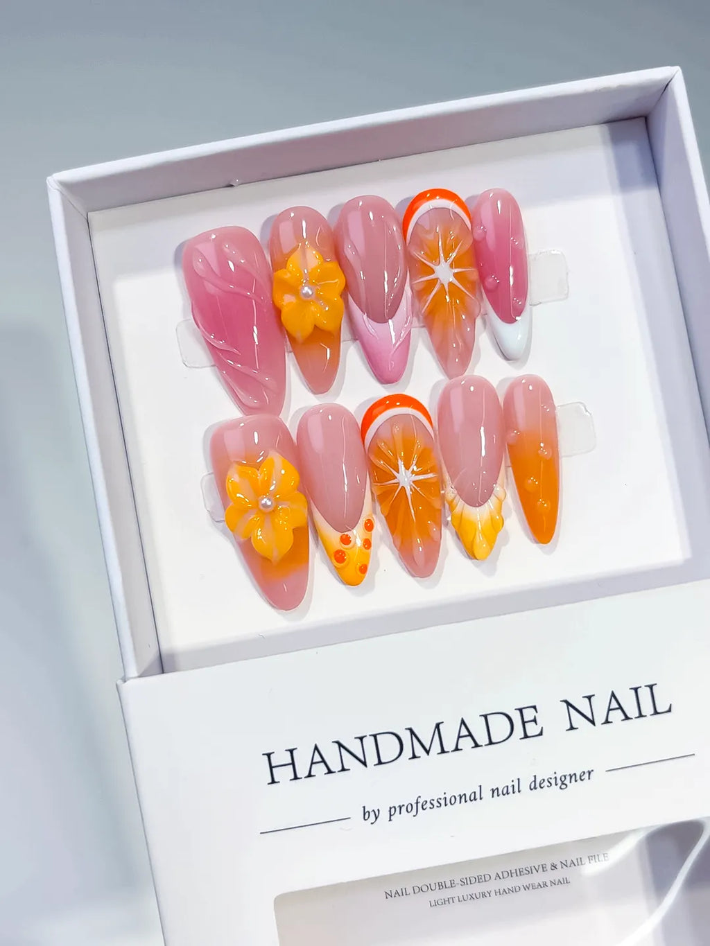 Pink Orange Ombre Flower Fruit press on nails angled view