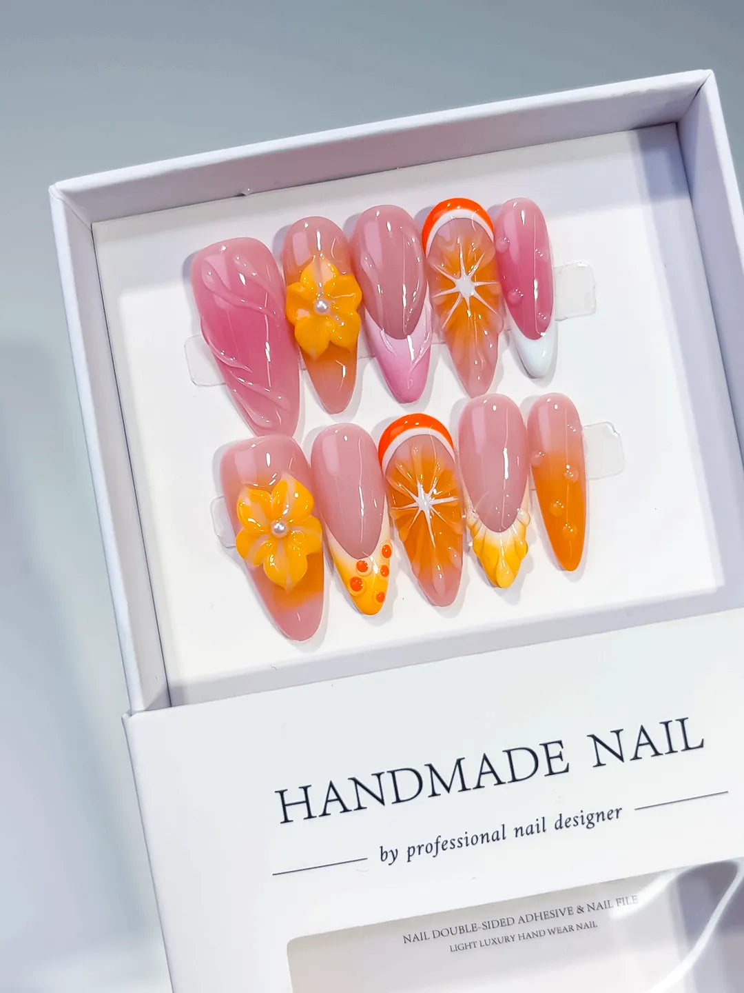 Pink Orange Ombre Flower Fruit press on nails angled view