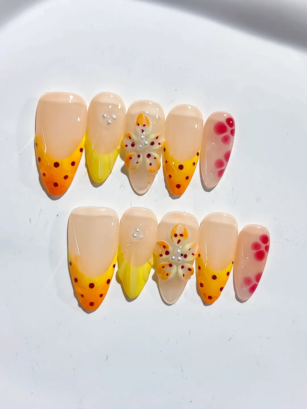 Nude Yellow Pink French tip Flower Dot Pattern press on nails close up