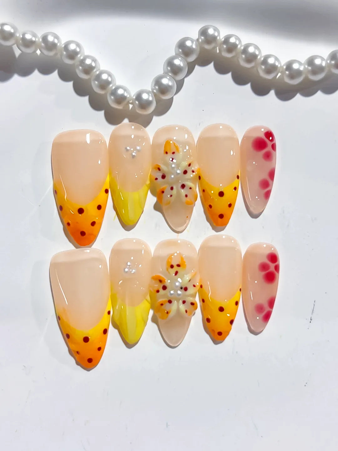Nude Yellow Pink French tip Flower Dot Pattern press on nails detail view