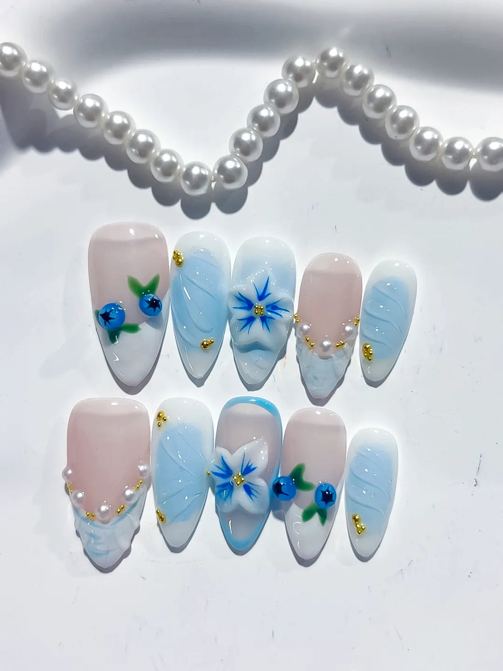 Nude Blue White French tip Flower Pearl press on nails close up