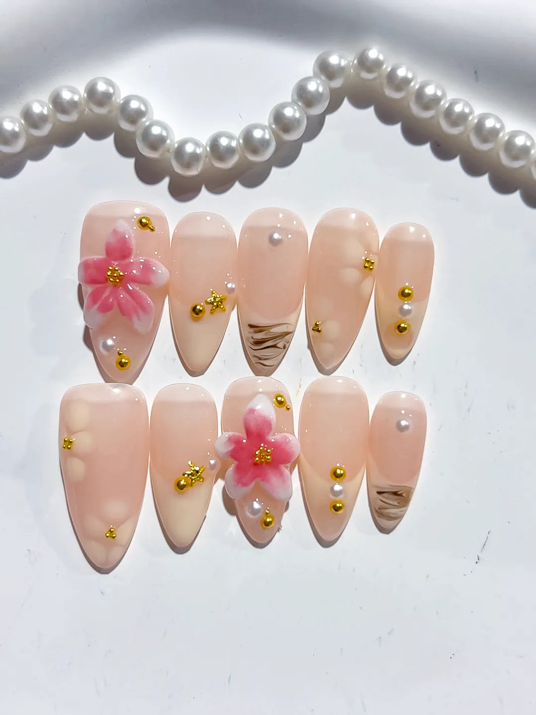 Nude Pink Gold Brown Solid color Flower Metallic Charm press on nails detail view