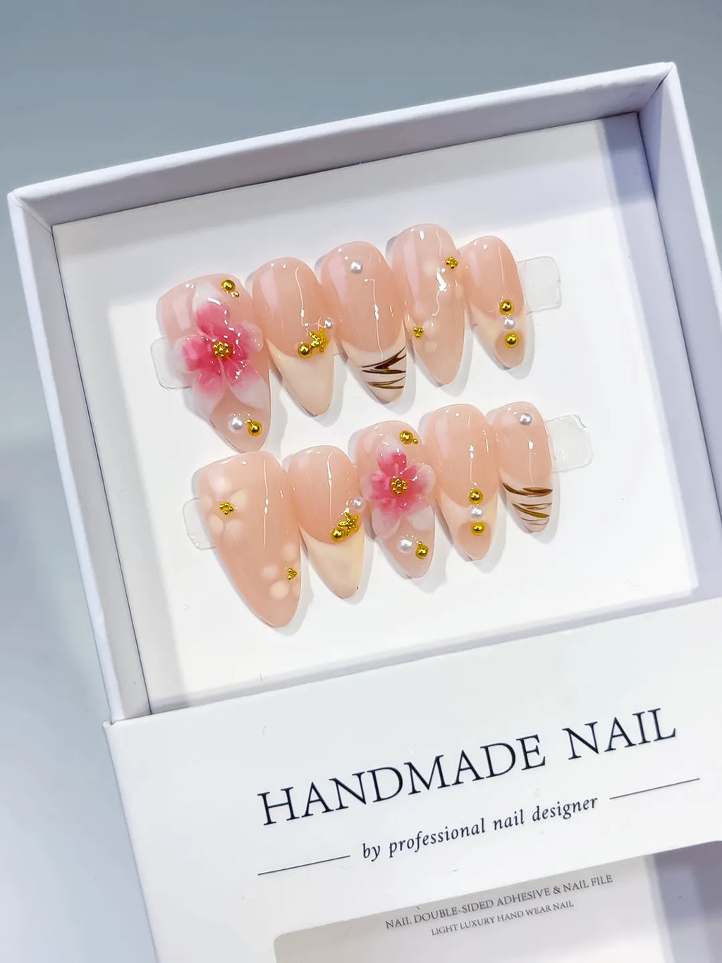 Nude Pink Gold Brown Solid color Flower Metallic Charm press on nails angled view