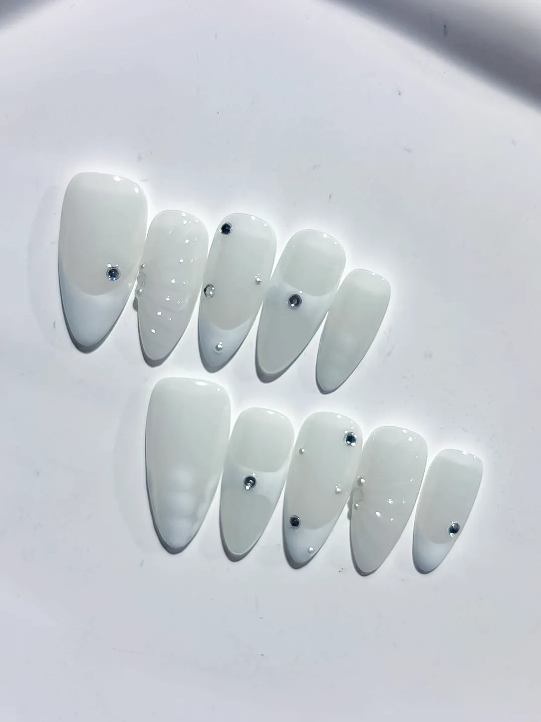White Solid color Rhinestone Shell press on nails close up