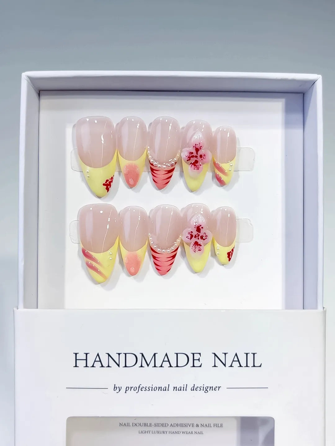 Nude Yellow Pink French tip Flower Pearl Stripe press on nails full set view