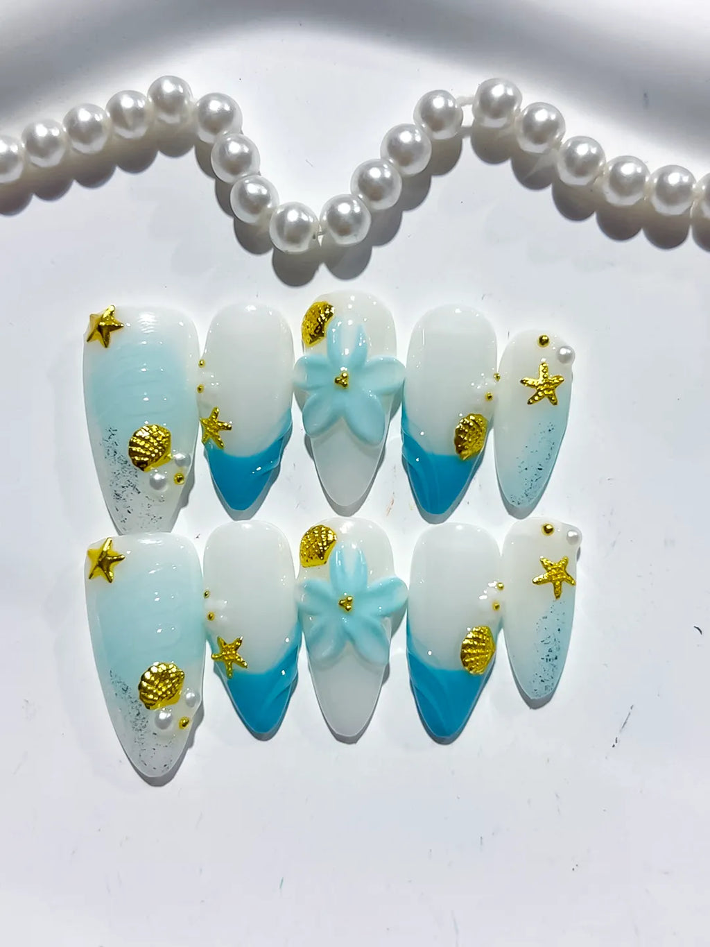 White Blue French tip Flower Star Shell press on nails close up