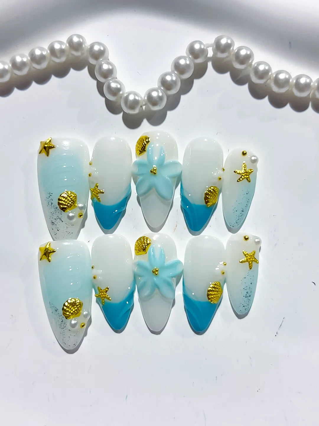 White Blue French tip Flower Star Shell press on nails close up