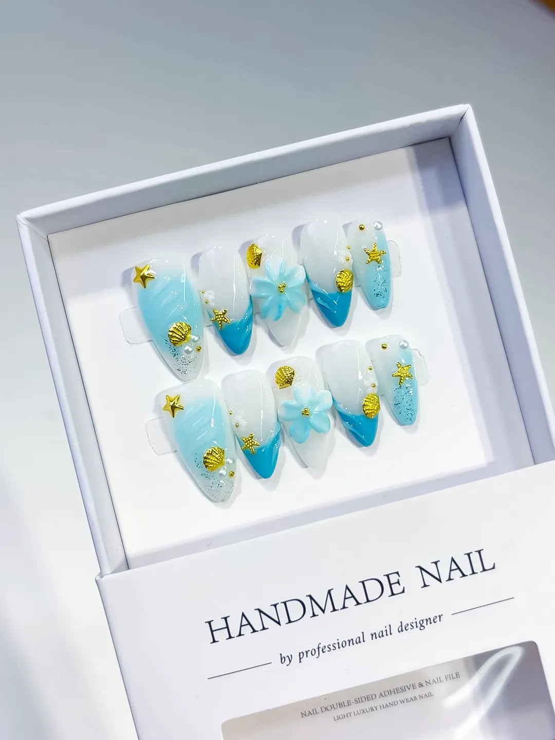 White Blue French tip Flower Star Shell press on nails angled view