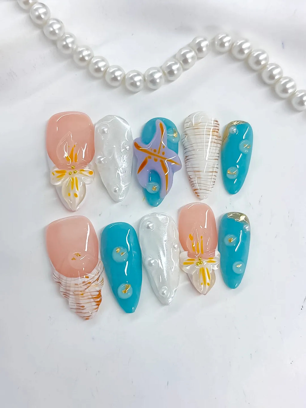 Nude Blue White Orange Gold Abstract Starfish Shell Pearl press on nails detail view