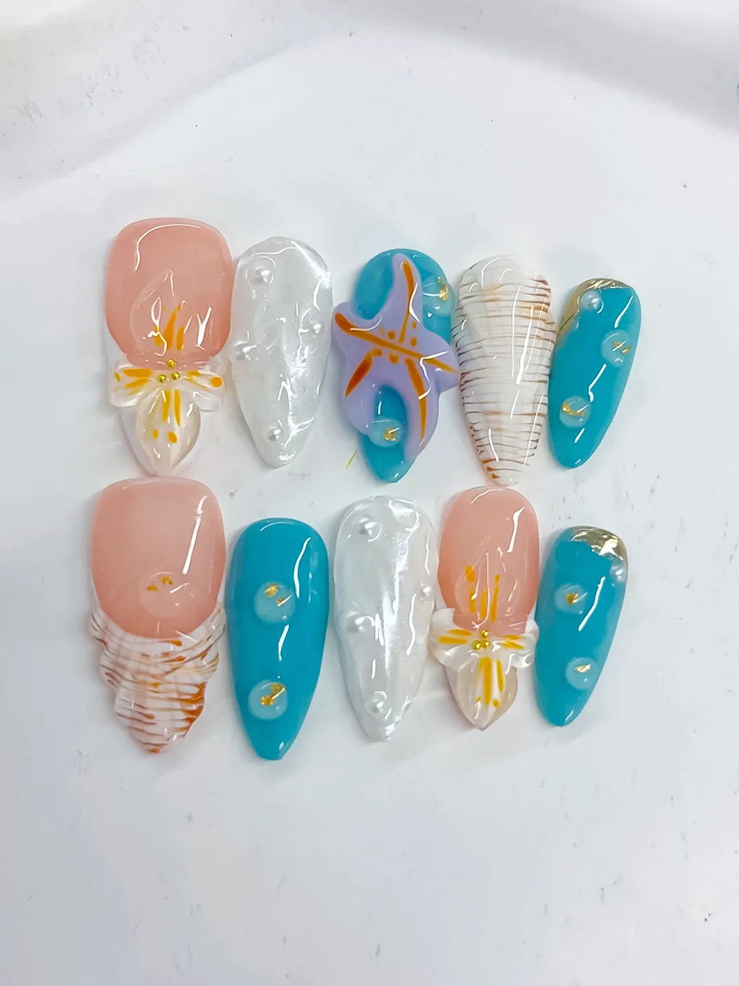 Nude Blue White Orange Gold Abstract Starfish Shell Pearl press on nails detail view