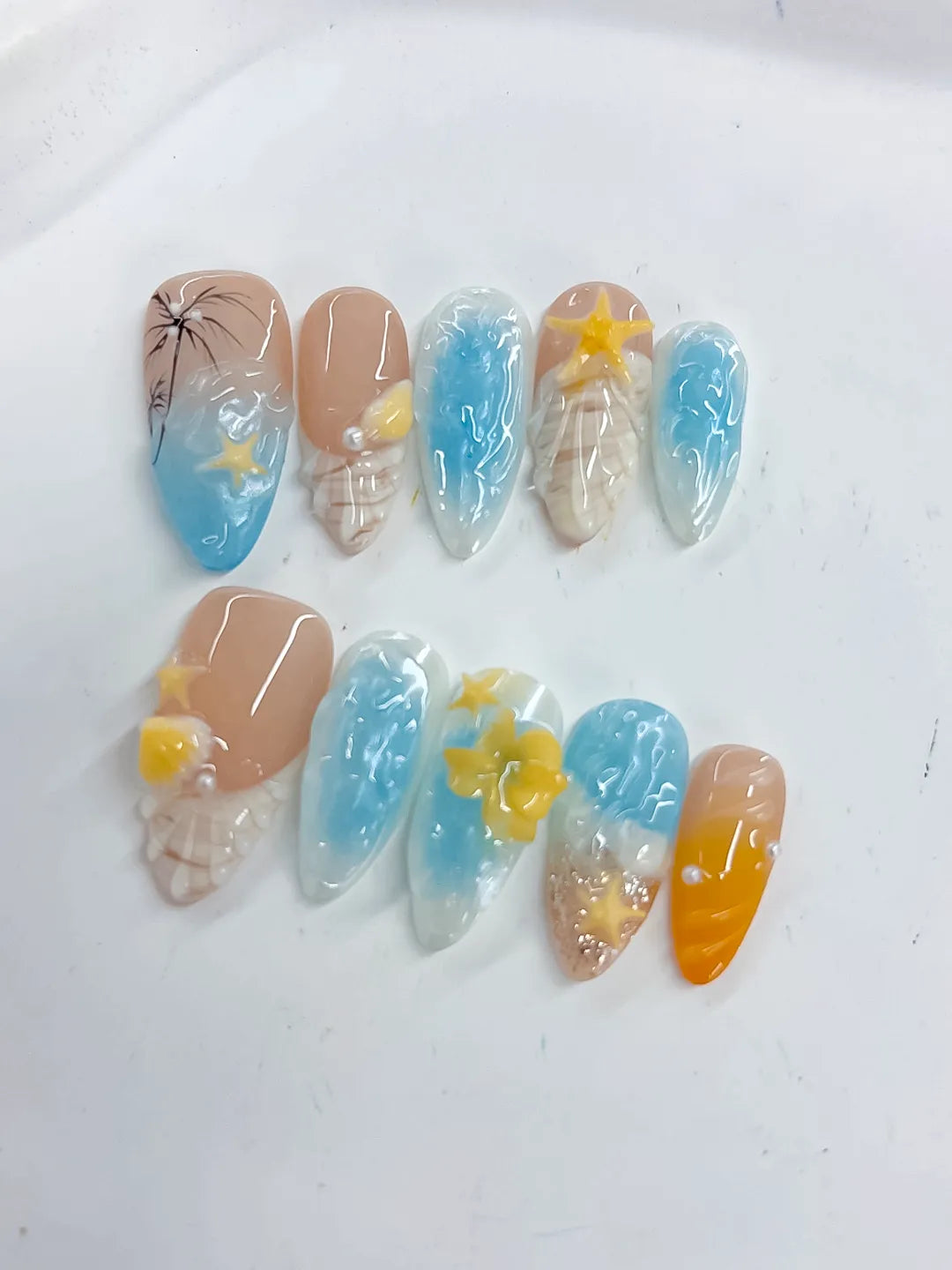 Nude Blue Yellow White Abstract Flower Star Shell press on nails close up