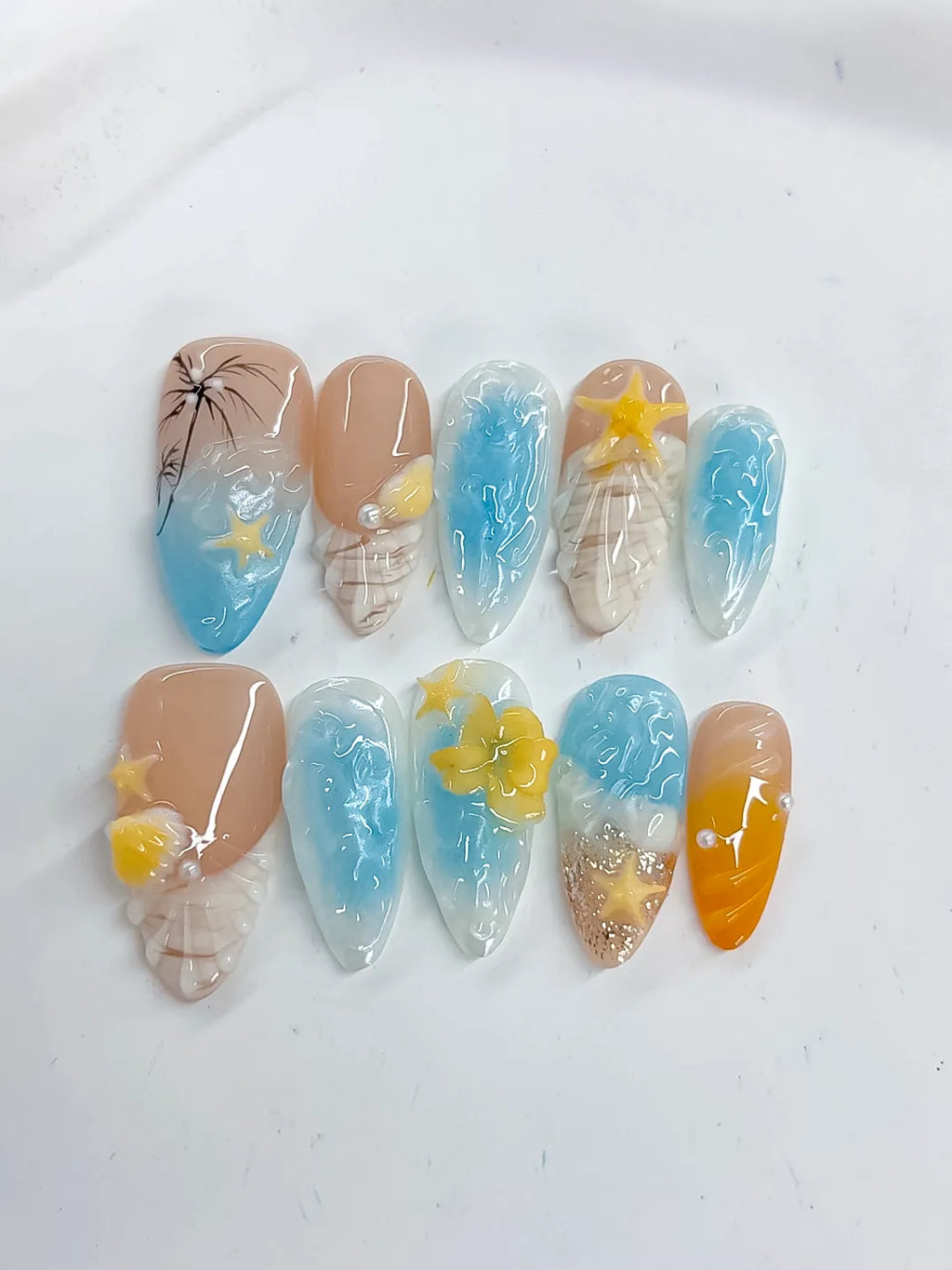 Nude Blue Yellow White Abstract Flower Star Shell press on nails detail view
