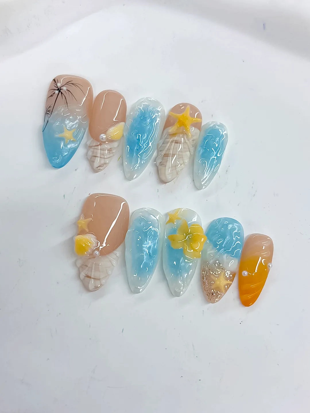 Nude Blue Yellow White Abstract Flower Star Shell press on nails detail view